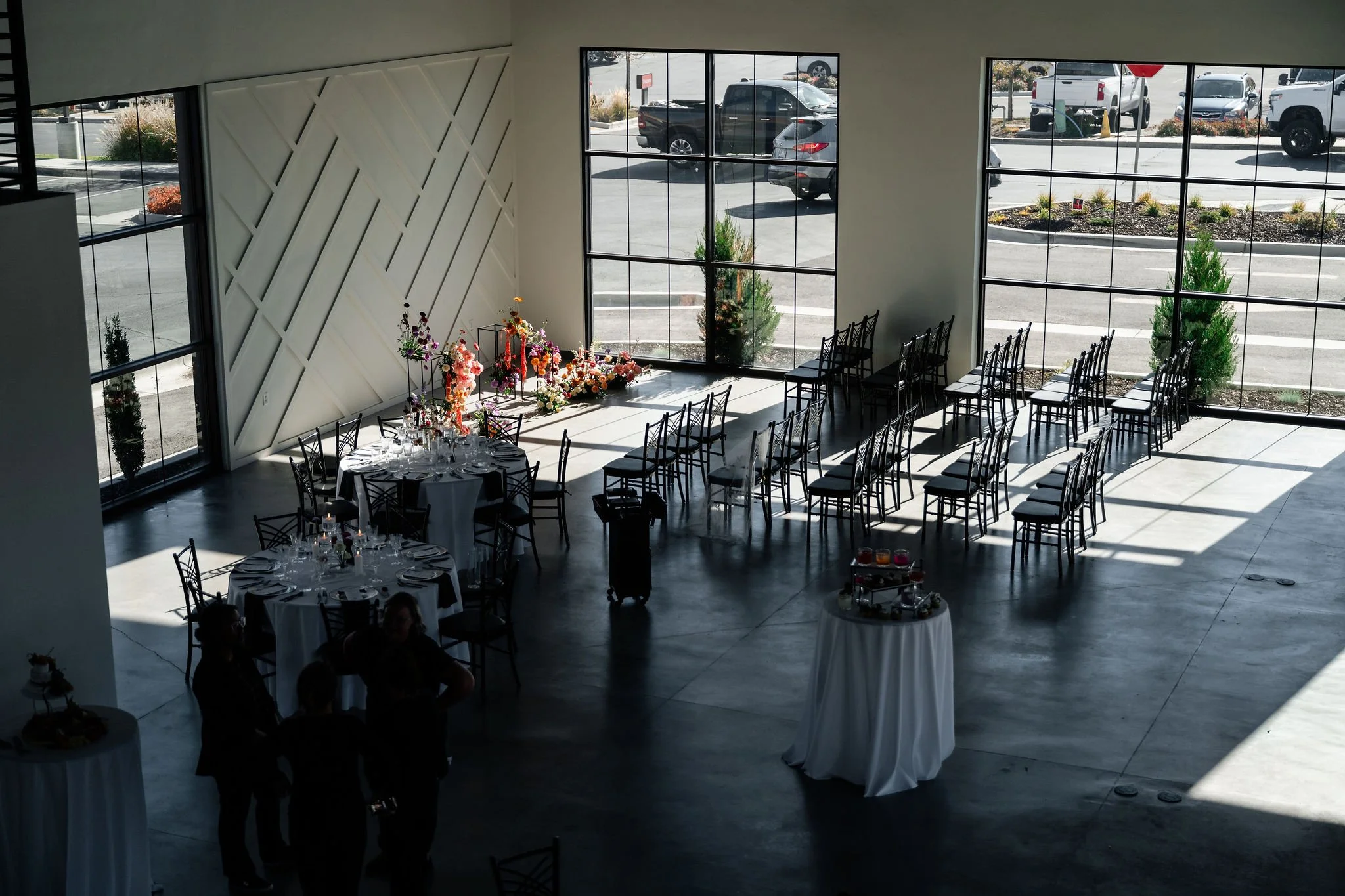 A higher vantage point view of our beautiful Utah wedding venue setup with rounds and ceremony seating