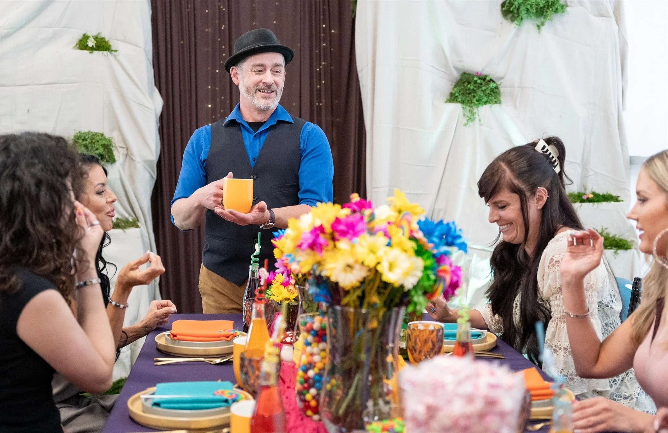 Willy Wonka style party host and guests in Utah