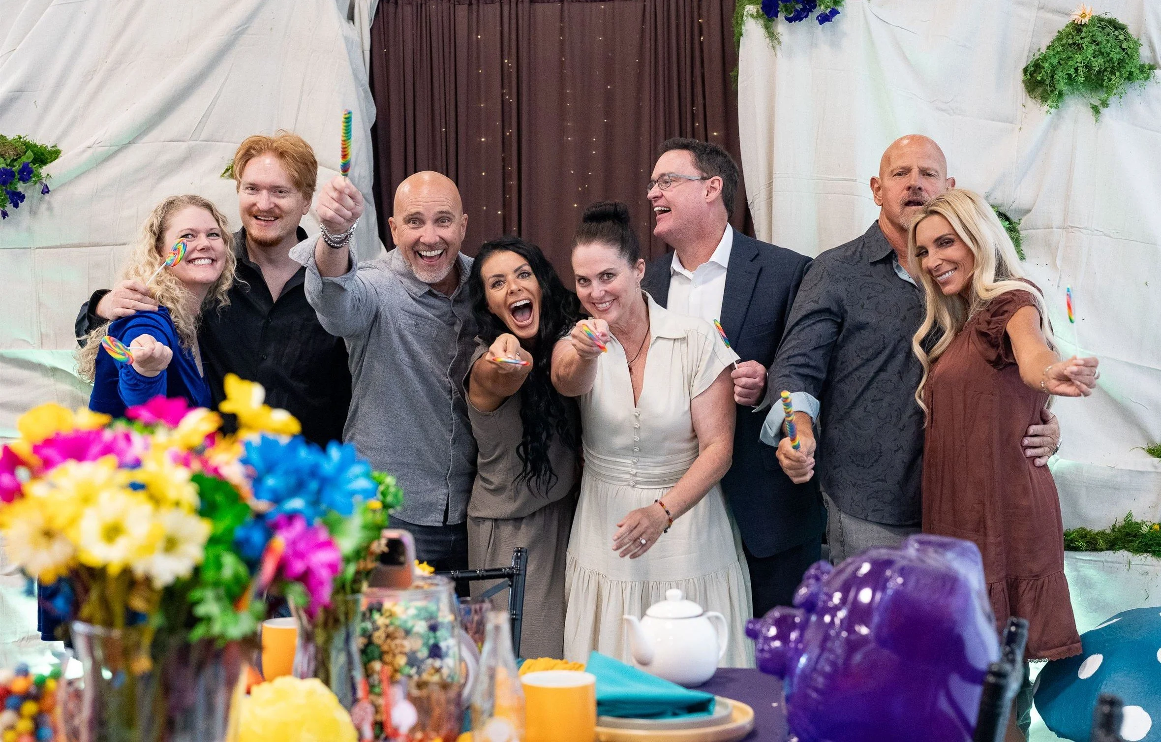 Happy guests at a colorful party in Herriman event venue