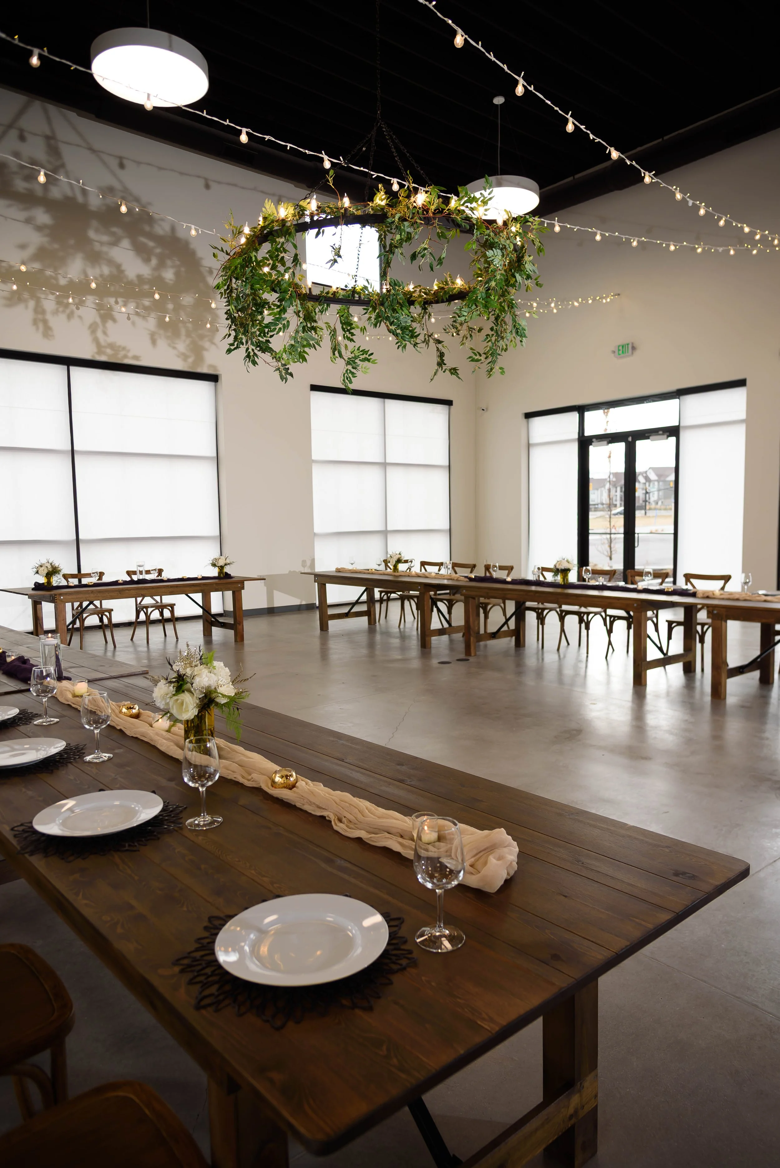 Side view of our Enchanted Hall setup for a wedding ceremony or holiday party at a modern Utah event venue