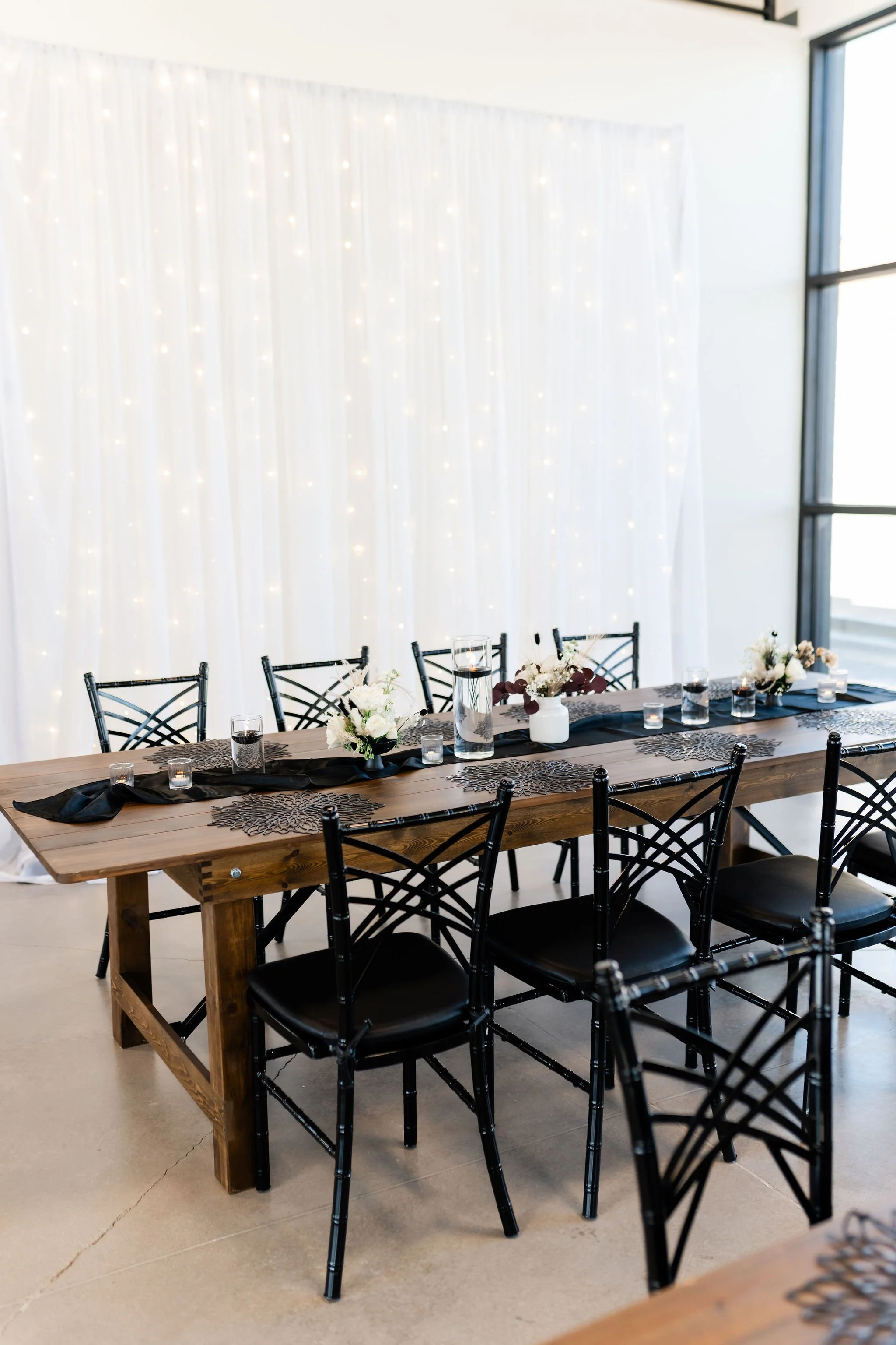 White drapes and lights setup in our Enchanted Hall