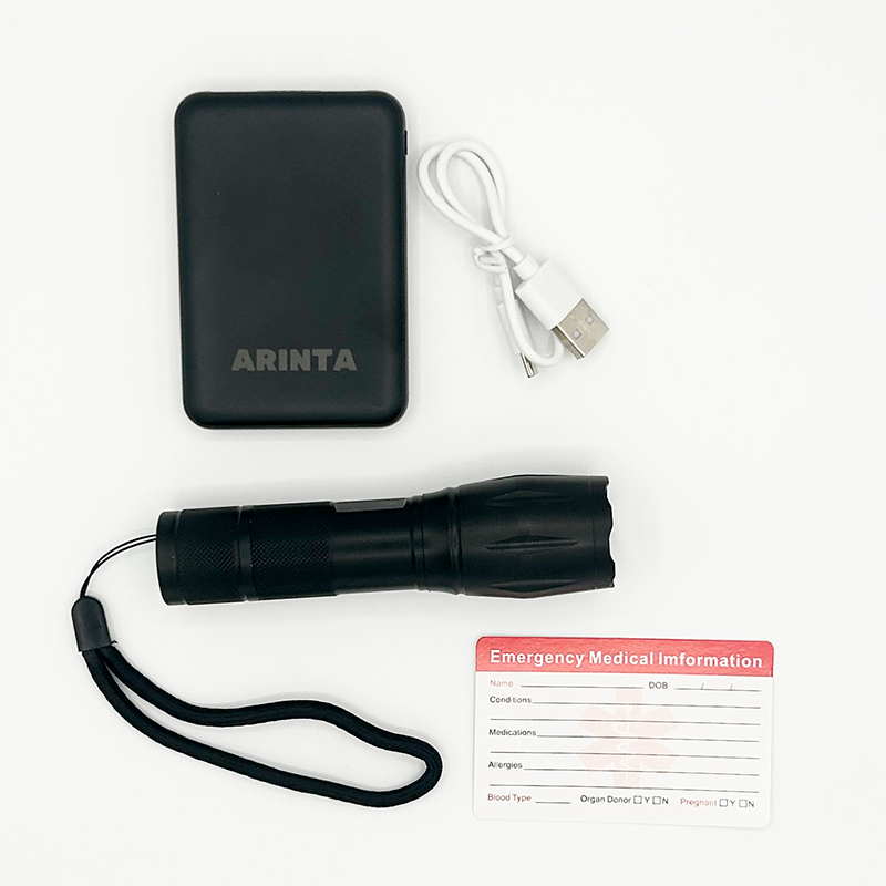 The Protest Pack includes a power bank, a white USB charging cable, a black flashlight with a wrist strap, and a red emergency medical information card.