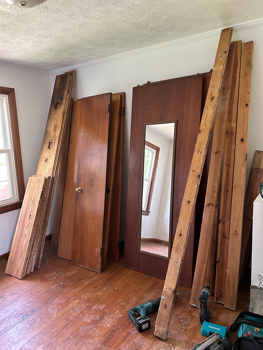 Salvaging lumber from the removed walls