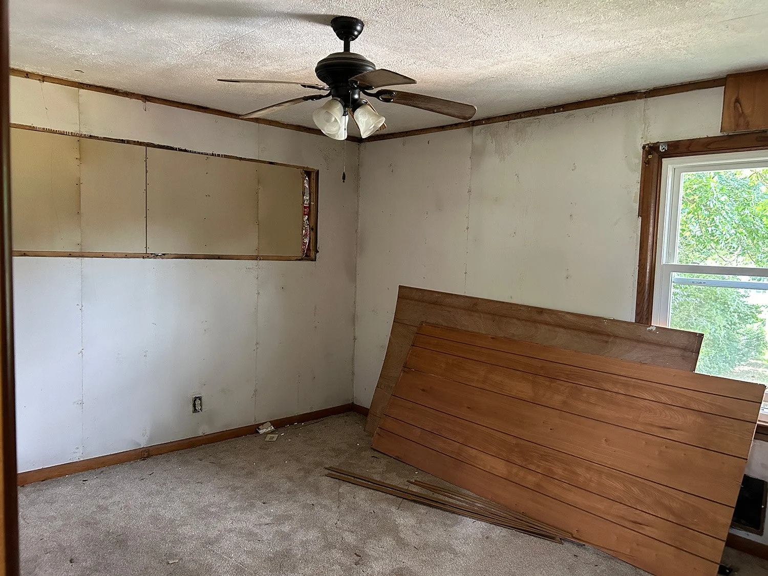 Uncovering an old window in the bedroom
