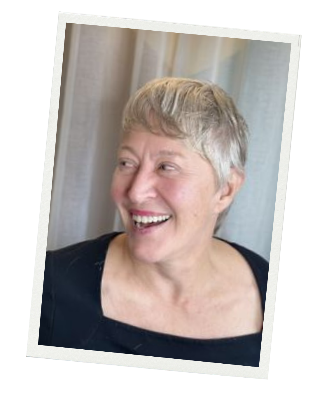 a middle-aged woman with a short pixie haircut