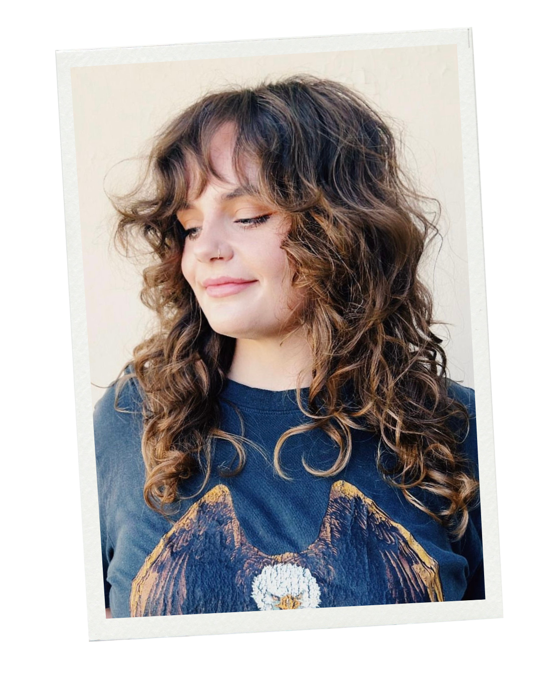 a young woman with curly 70s shag,wolfcut, layered hairstyle with bangs
