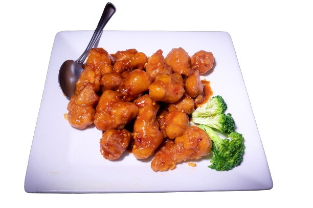 Plate of General Tso chicken with broccoli on a white square dish