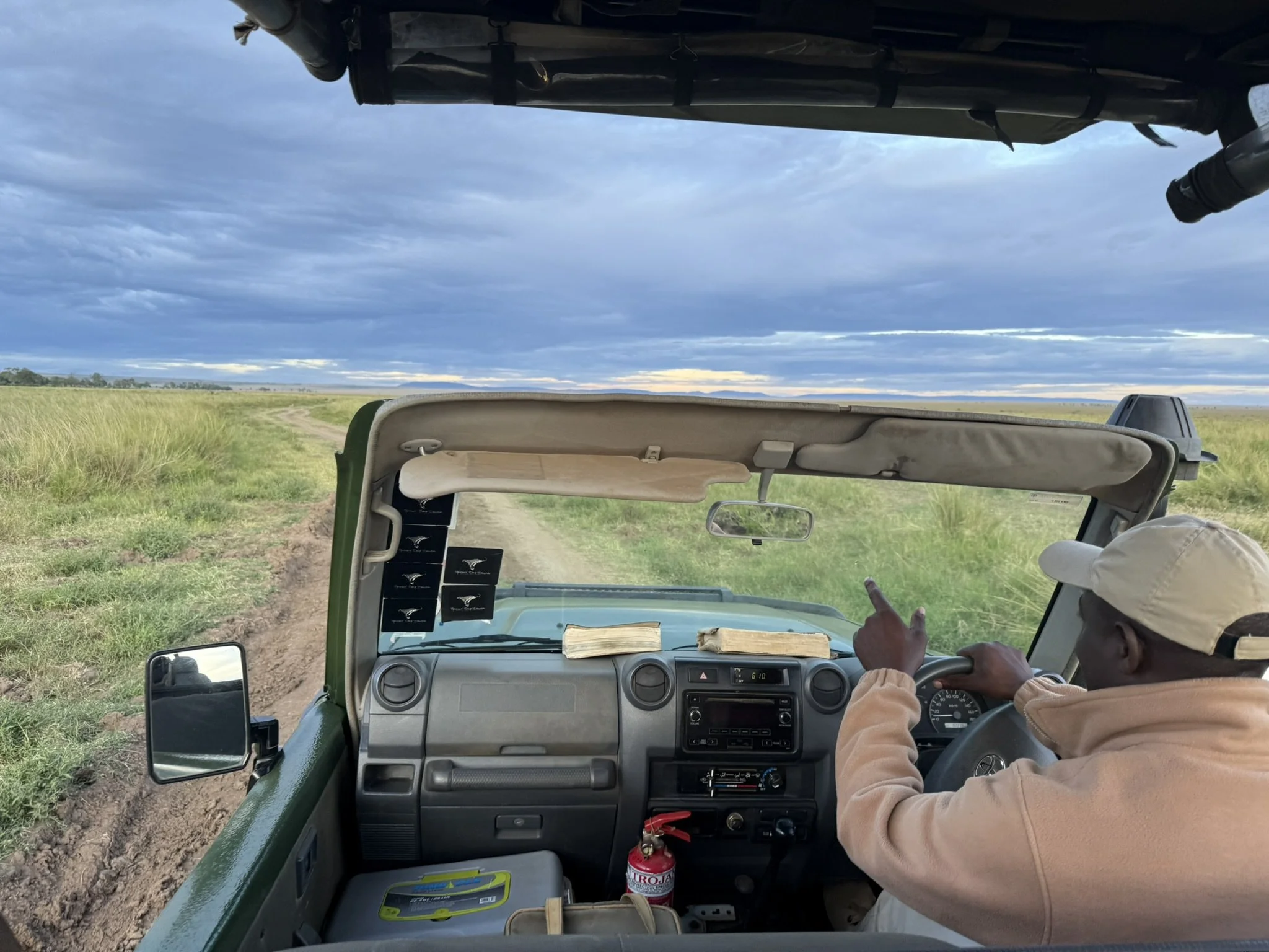 Safari 4x4 driving through the African wilderness during a game drive
