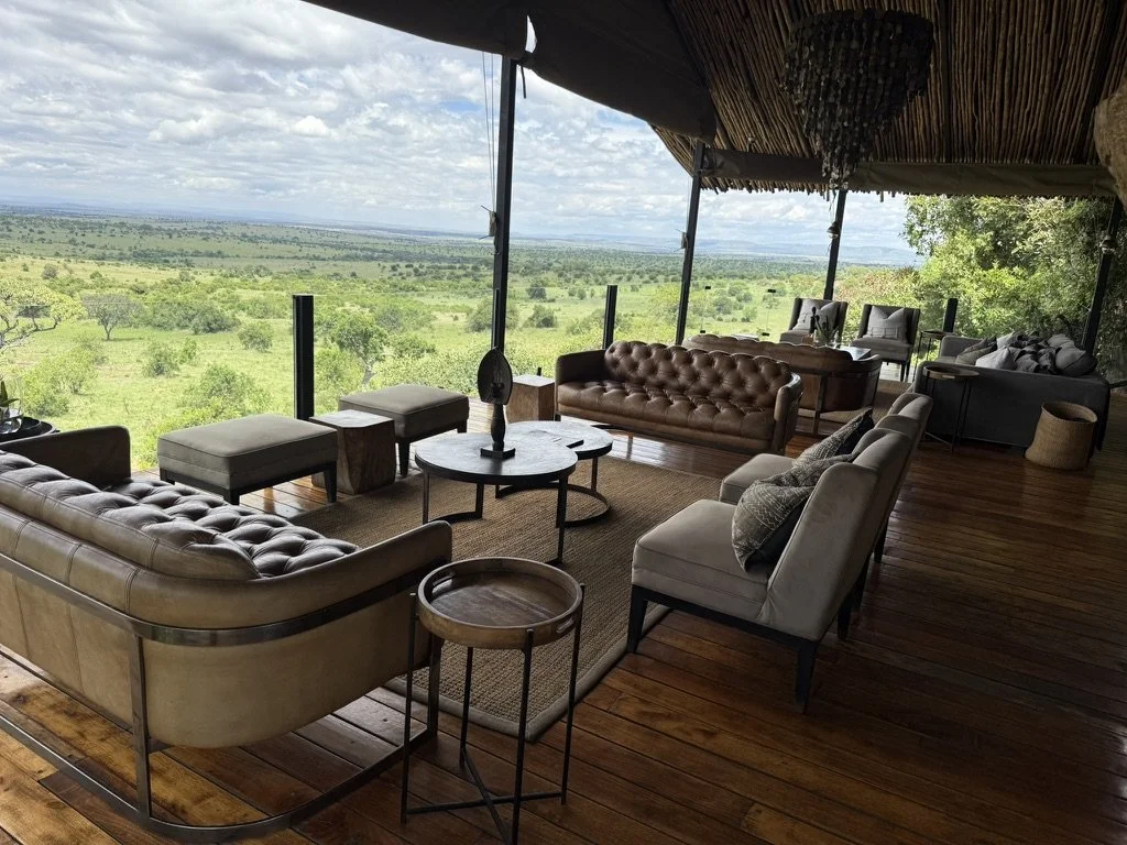 Luxury dining room of private safari lodge overlooking African savanna