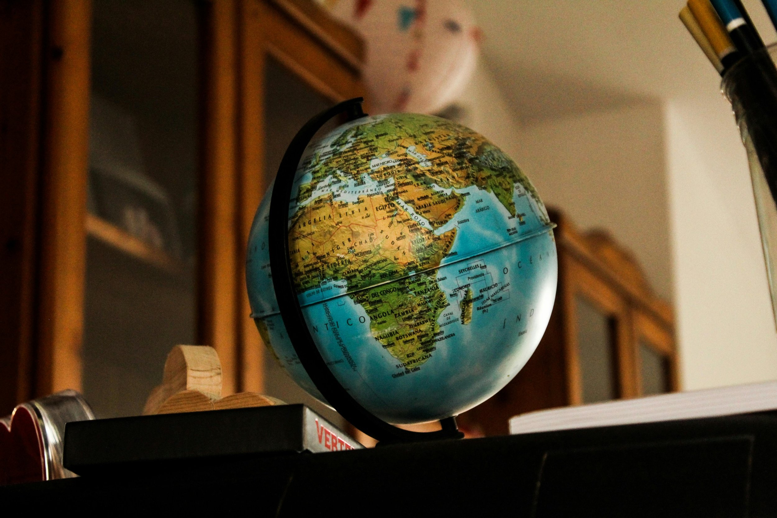 Globe with Africa prominently displayed, highlighting the continent’s geography and safari destinations