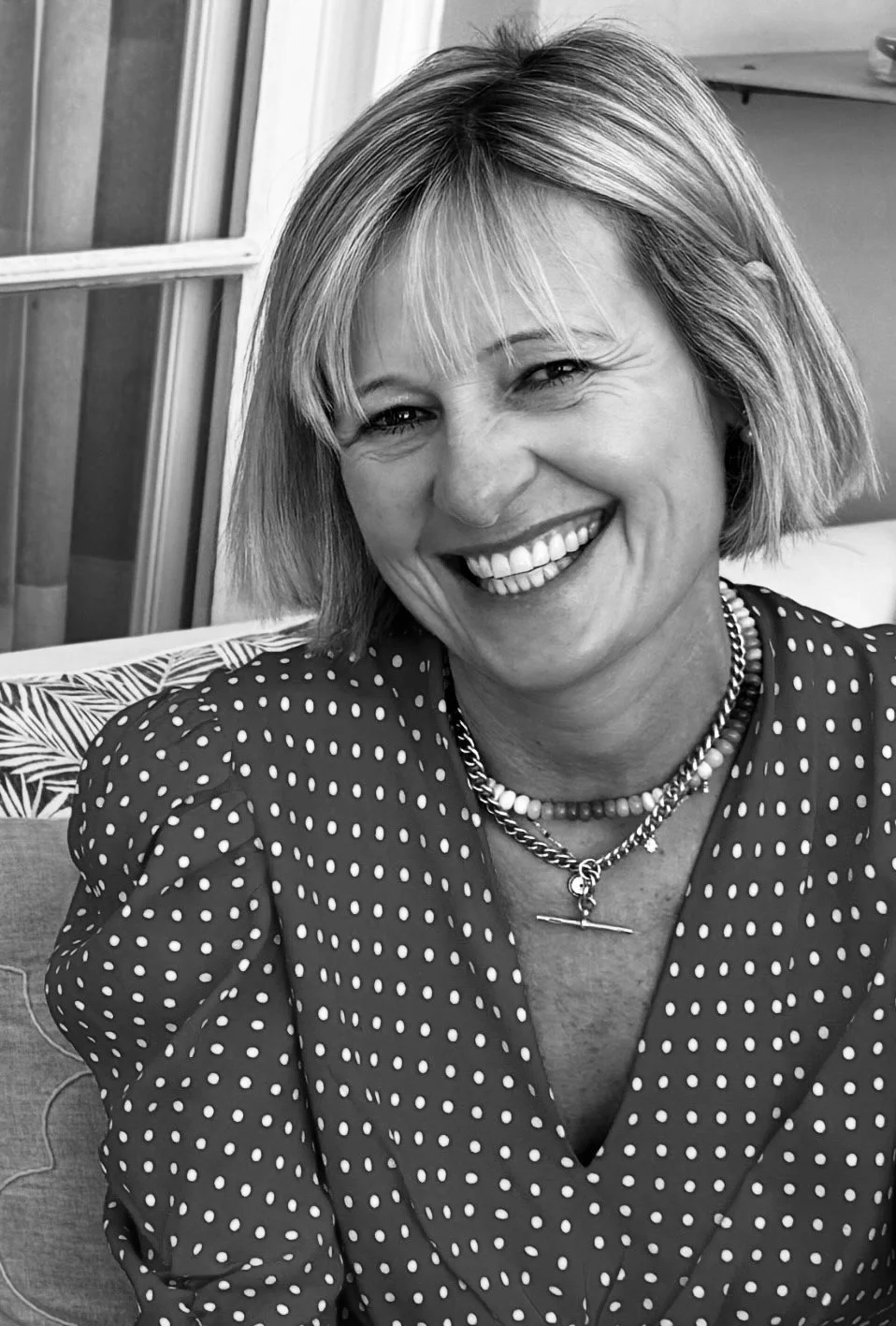 A black and white photo of Amy Williams, founder of Amy Williams Consultancy. Amy started her career at Sauce Communications in 2001 as its first employee and working with notable chefs Gordon Ramsay, Angela Hartnett and Tom Kerridge