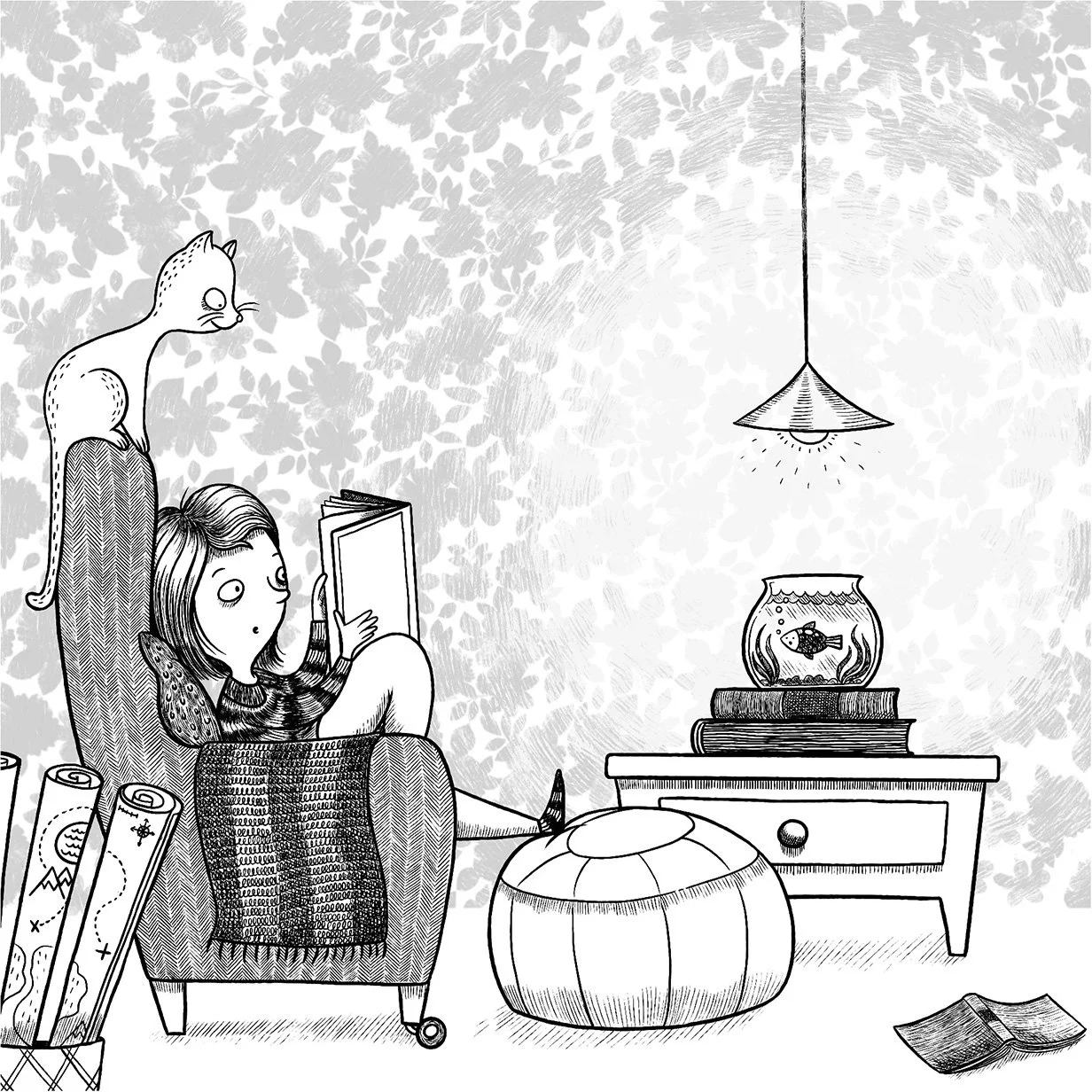 A girl sitting in an armchair reading a book with a cat on her head and a fish in a bowl on a table nearby. There is a lamp hanging from the ceiling and rolled-up papers in a holder on the left. An open magazine is on the floor.