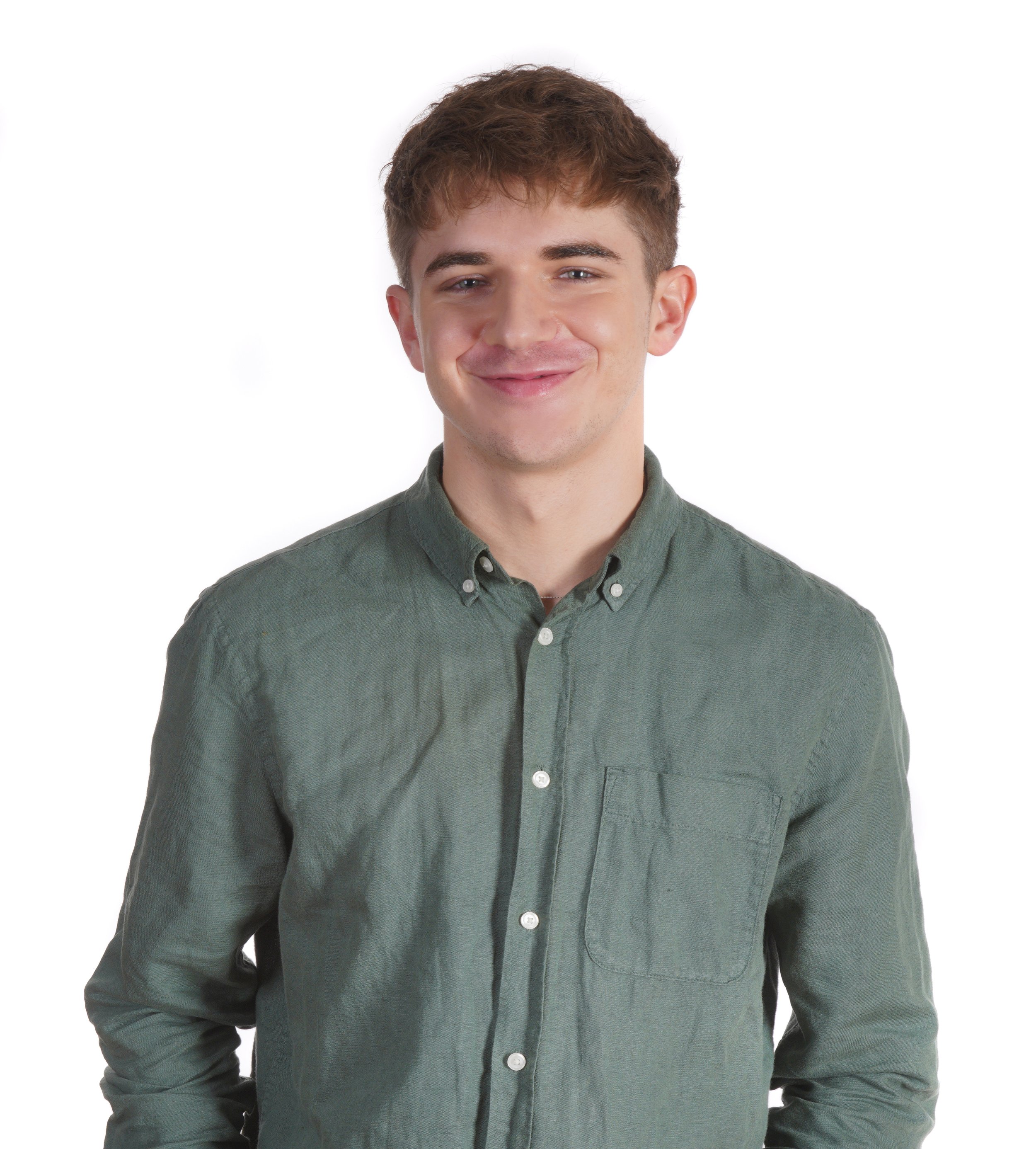 A young man with light brown hair and fair skin smiling, wearing a green button-up shirt, against a plain white background.