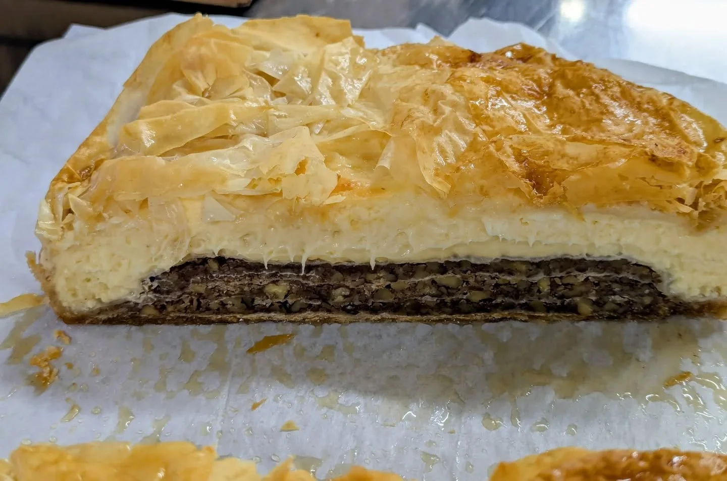 Maple pecan baklava cheesecake. Cheesecake layered over pecans, local honey, and Northern Michigan maple syrup, wrapped in phyllo.

Custom orders and fresh restocks at Oleson's &mdash; both locations today.

#SAMAHABakery #BaklavaCheesecake #MaplePec