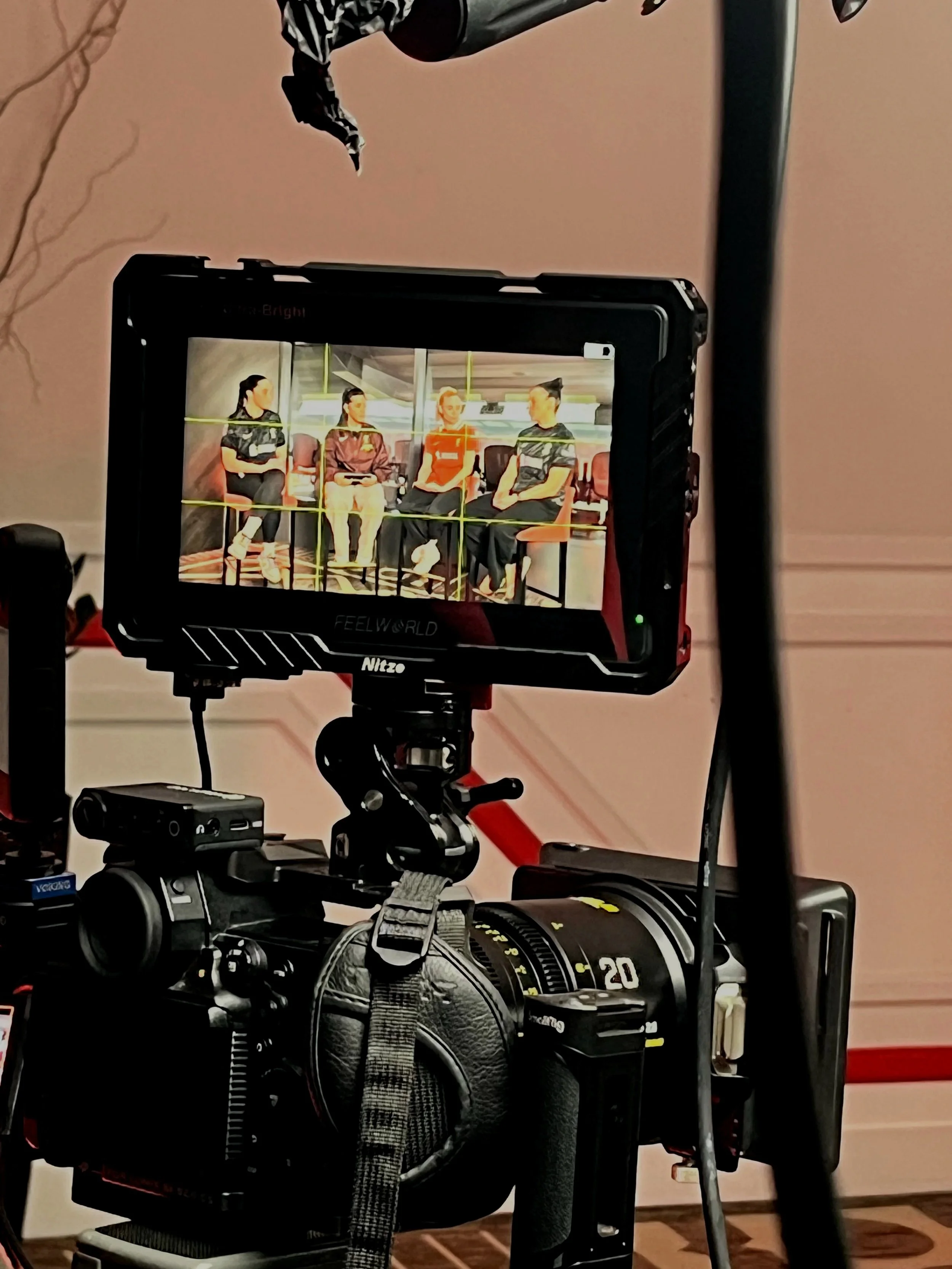 Camera filming an interview with LFC Women