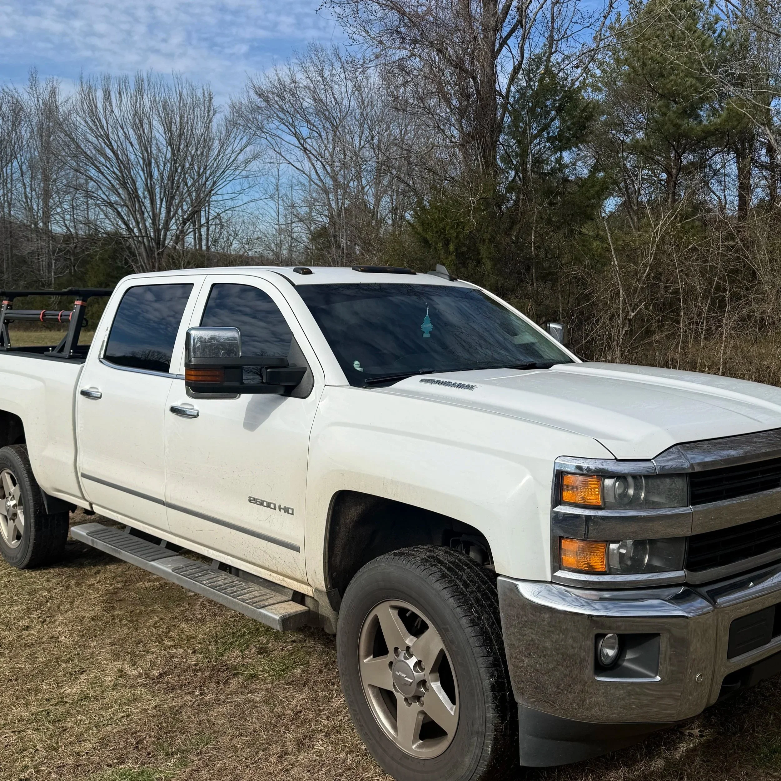 Tint Matched 20% Premium Plus on front sides and 2% sun visor bar.