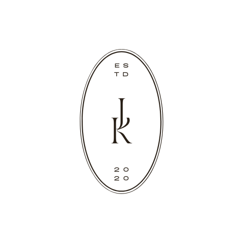 A circular logo with a stylized letter 'K' in the center, surrounded by the text 'EST'D 2020' inside an oval outline.