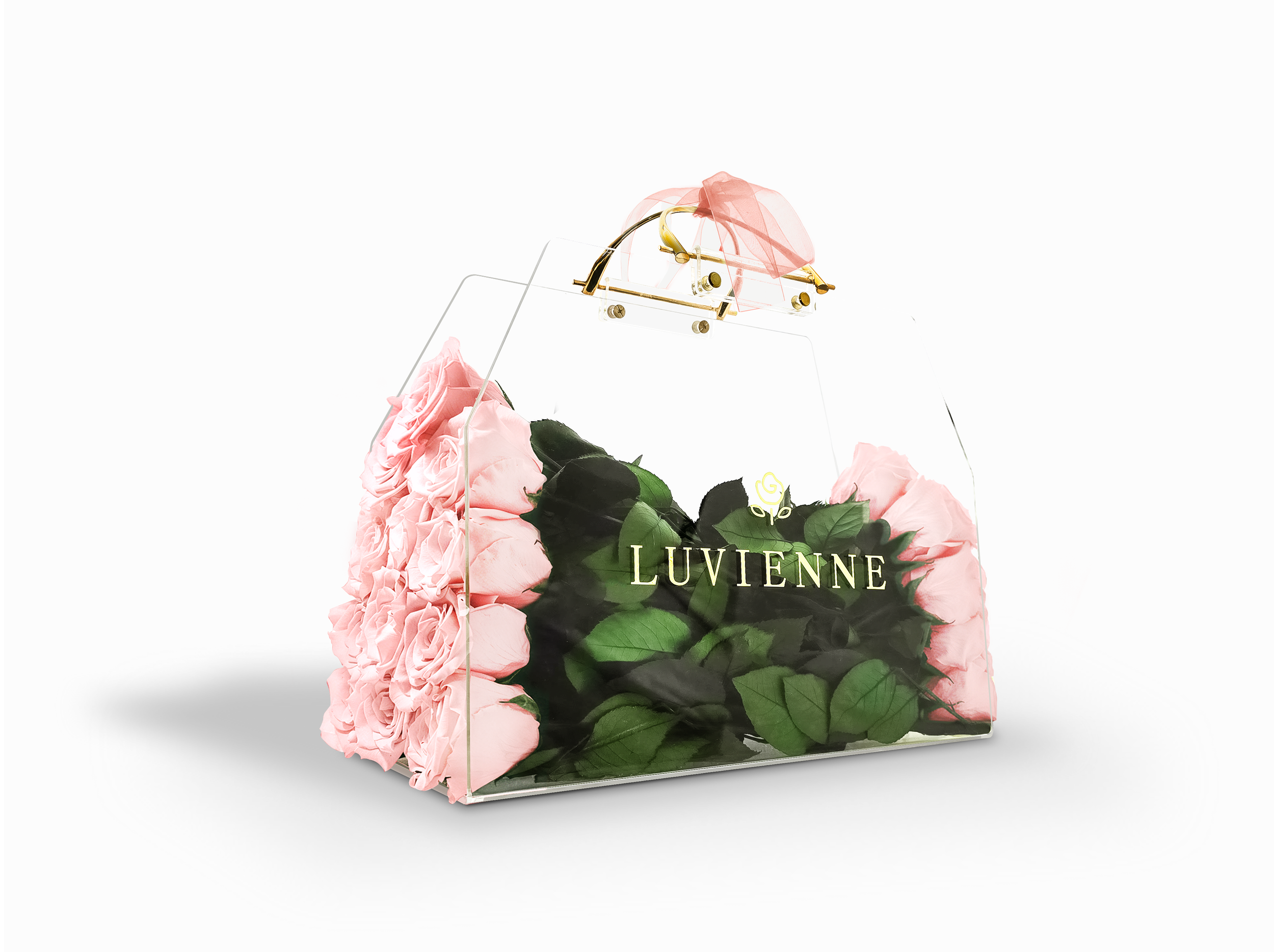 En transparent blomkruka med ljusrosa rosor och gröna blad, med texten LUVIENNE på fram sidan.