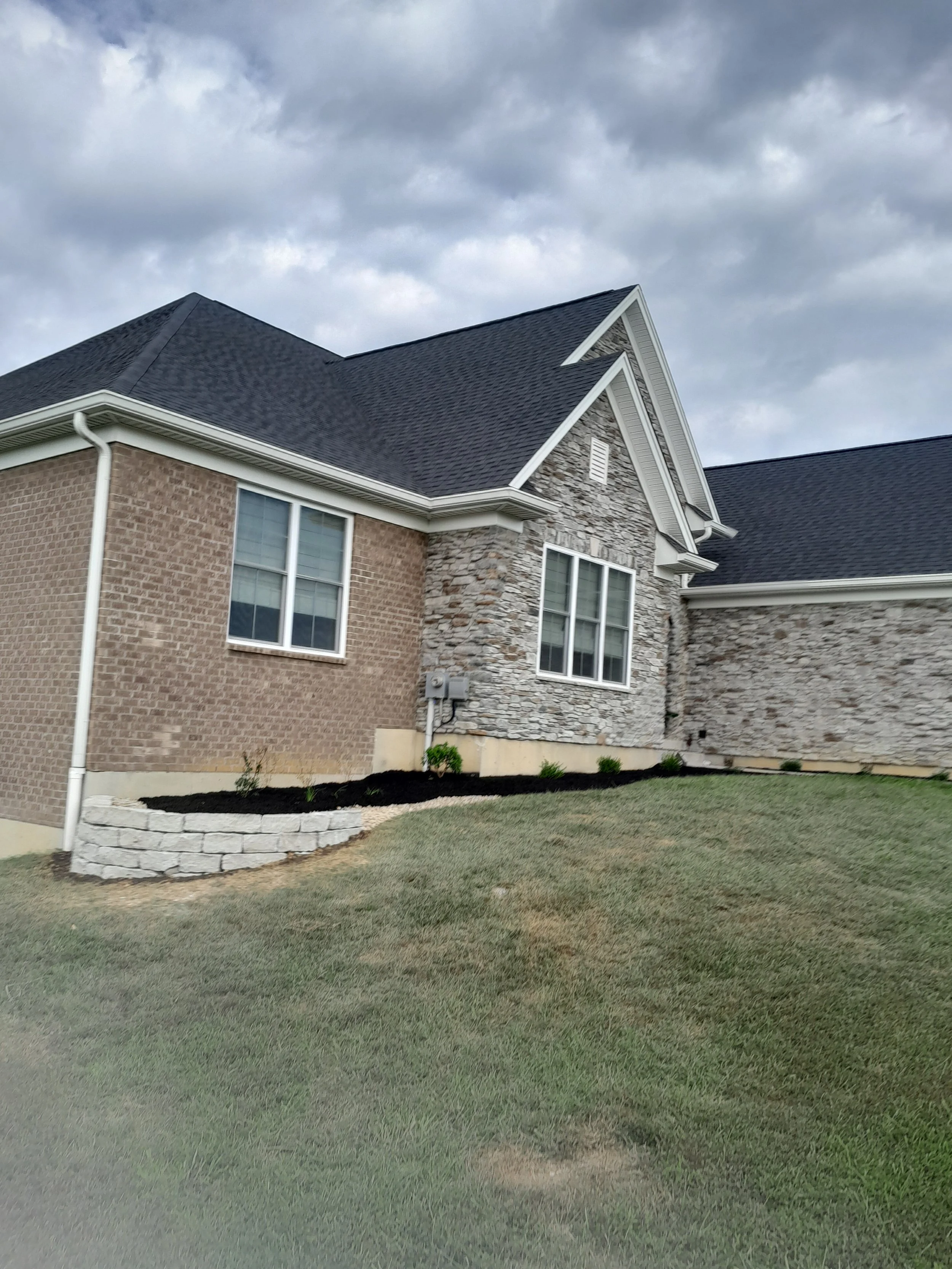 Natural stone retaining wall