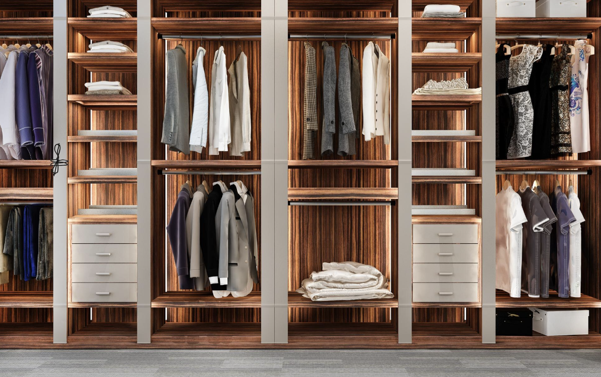 Custom-built wooden closet with neatly organized clothing and folded linens.