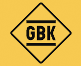 Yellow diamond-shaped sign with black border and the letters 'GBK' in the center.
