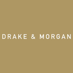 Gold-colored background with white text that reads 'DRAKE & MORGAN'.