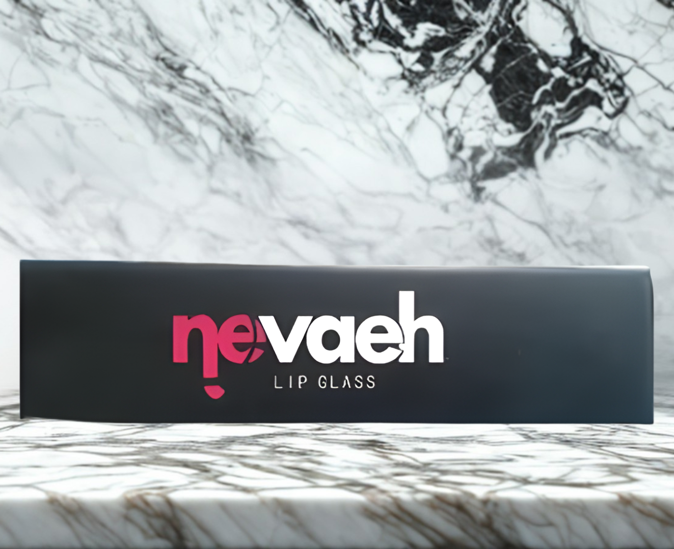 A sleek black rectangular box labeled “nevaeh LIP GLASS” sits on a white marble surface. The branding uses bold white text with a soft pink accent, giving the packaging a modern, high‑end cosmetic feel. The lighting highlights the clean edges of the 