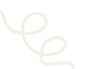 A white, curly, rope-like object on a black background.