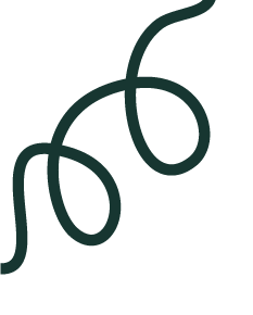 Close-up of a green, curly cord or string on a black background.