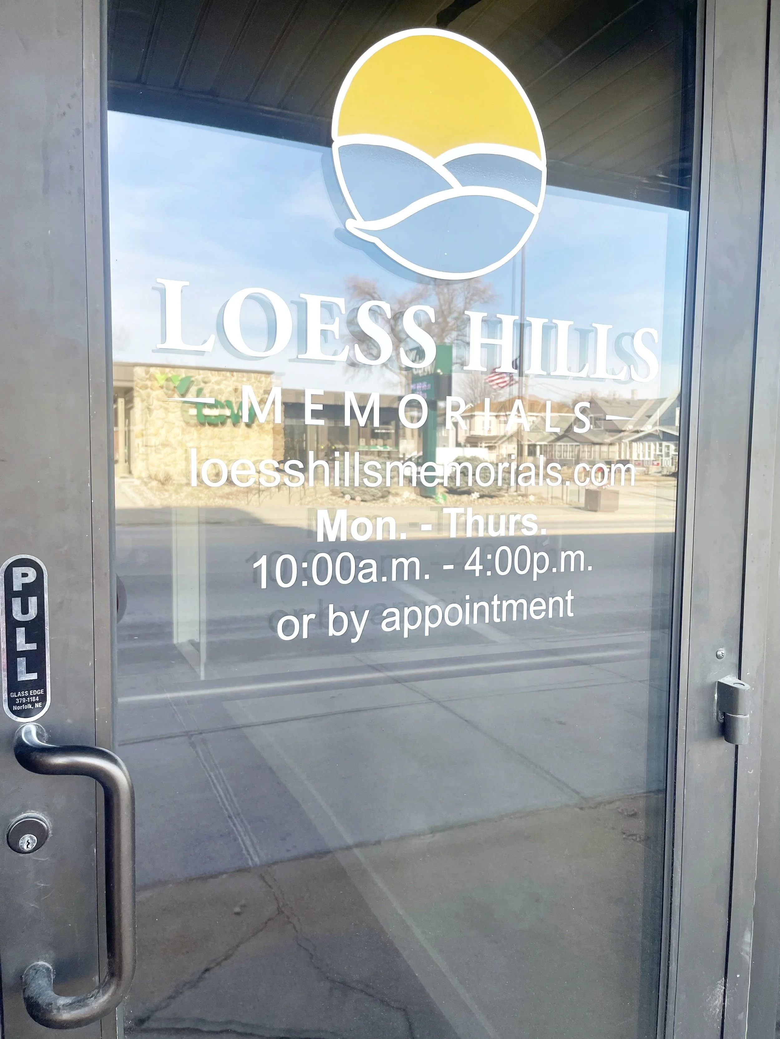 Front entrance to Loess Hills Memorials showroom in Missouri Valley, Iowa, welcoming families for memorial design consultations