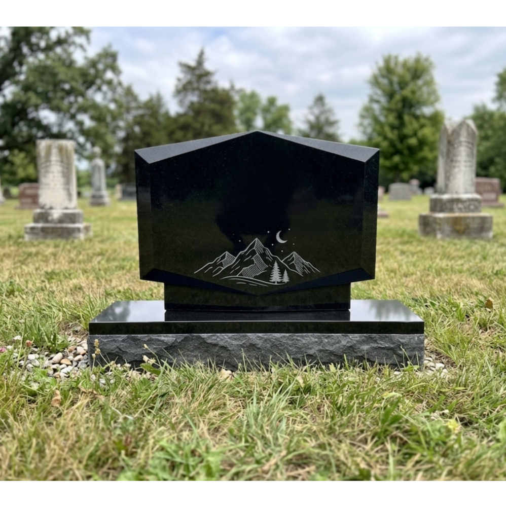 Custom black granite one-person upright headstone, defined by hexagonal shape and laser-engraved mountain scene set in Iowa cemetery