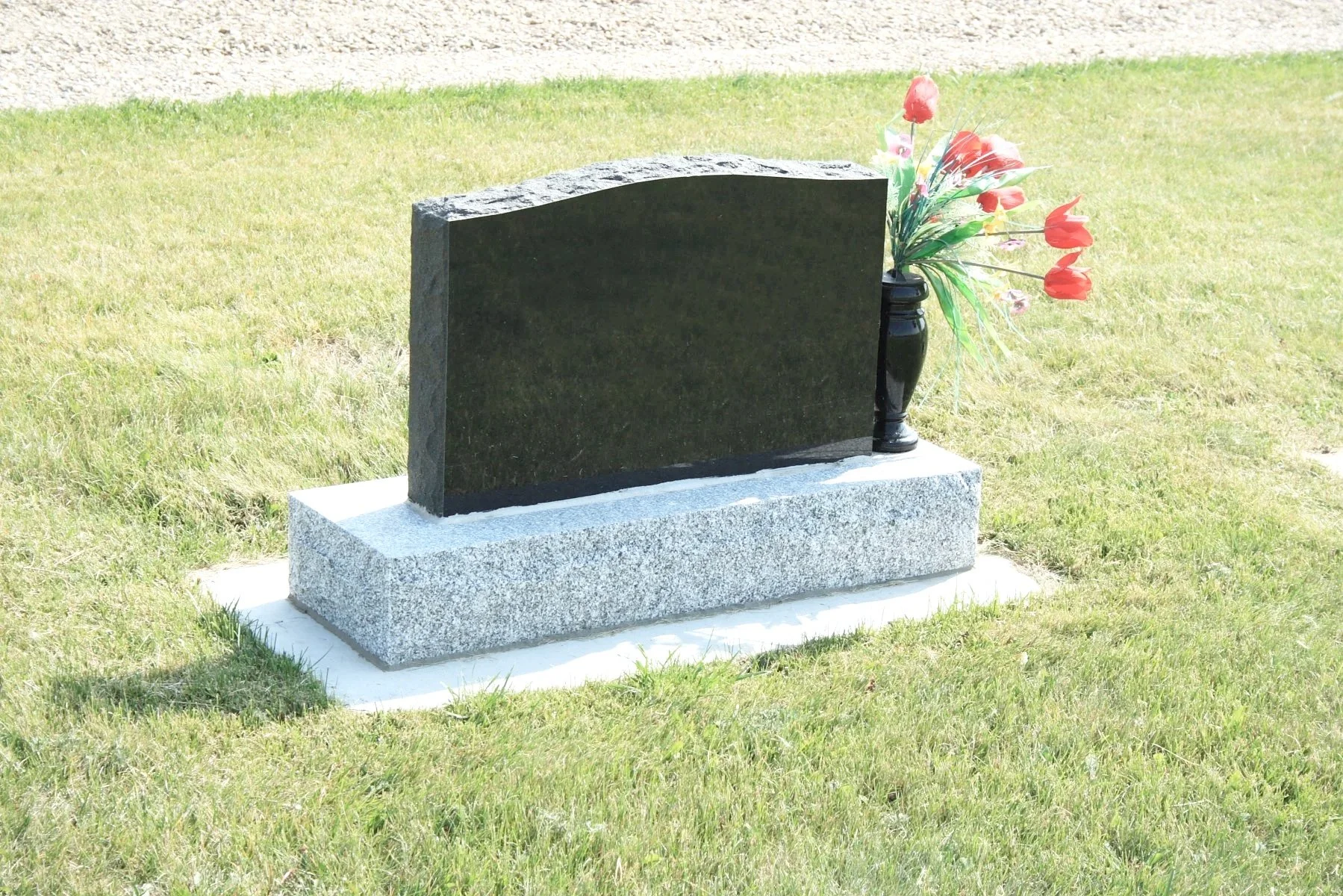 Black granite headstone for cemetery memorials in Western Iowa and Omaha metro