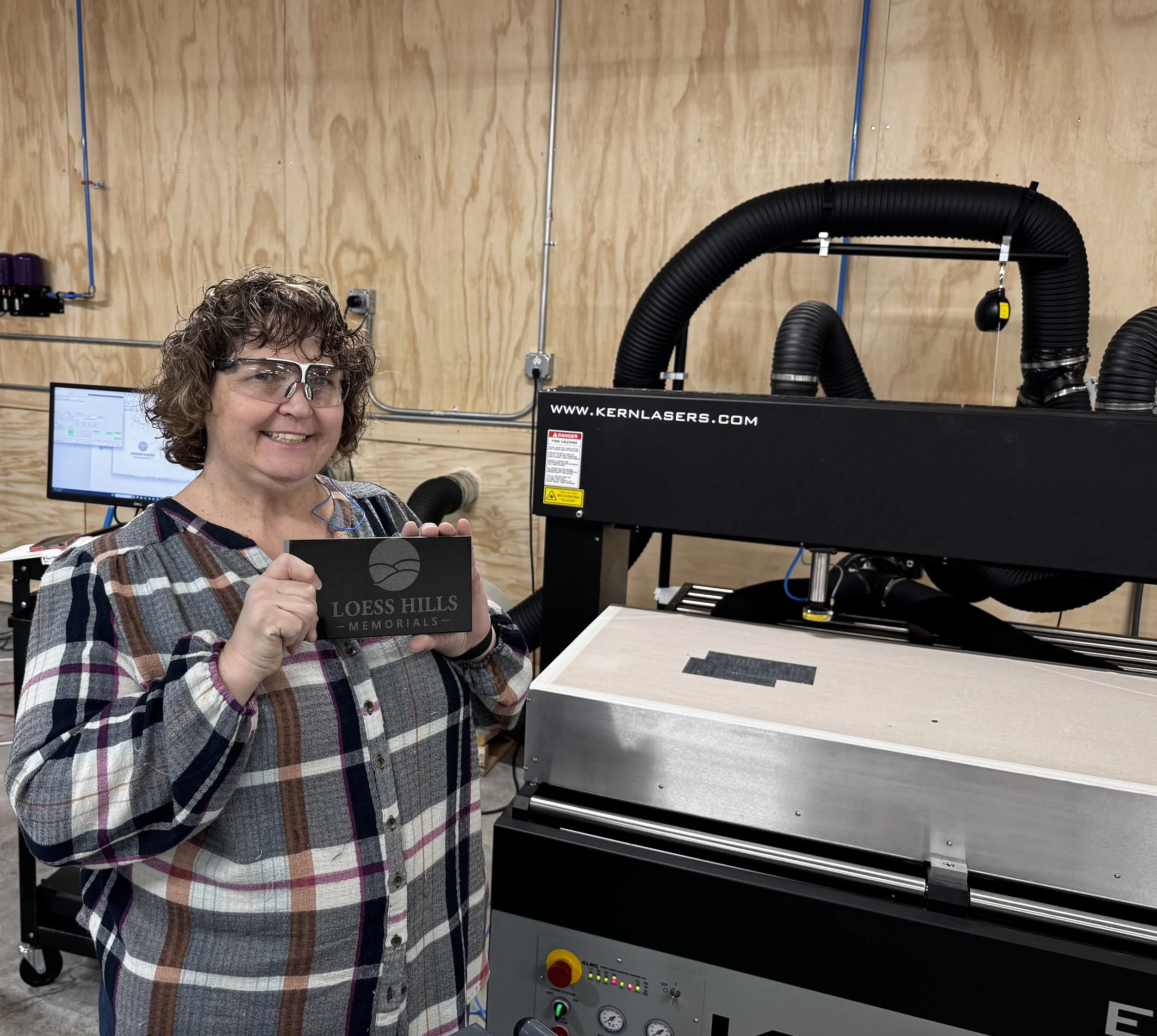 Elizabeth Dillinger, Owner and COO of Loess Hills Memorials, serving Harrison County and Council Bluffs with precision laser engraving granite memorials.