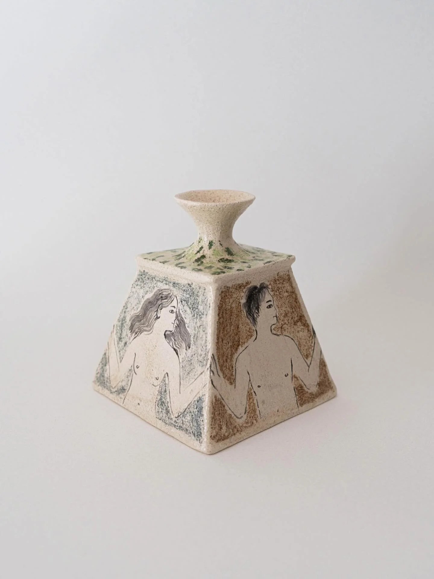 Comunidad Vase

Handbuilt in white stoneware, this small temple is formed around four human figures, each hand-painted with chalk crayons and finished with a glossy clear glaze.

#CraftersOfToday #EstherLara #HandbuiltCeramics #WomenInCraft #Barcelon