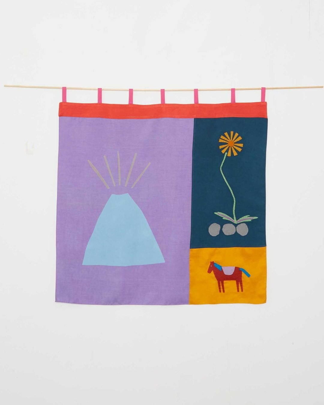 Par&iacute;cutin Banner

Handcrafted in the UK by Caitlin Hinshelwood, this hand screen printed silk banner with wool felt appliqu&eacute; carries the story of a horseback journey to Volc&aacute;n Par&iacute;cutin in Mexico. Each silk element is hand