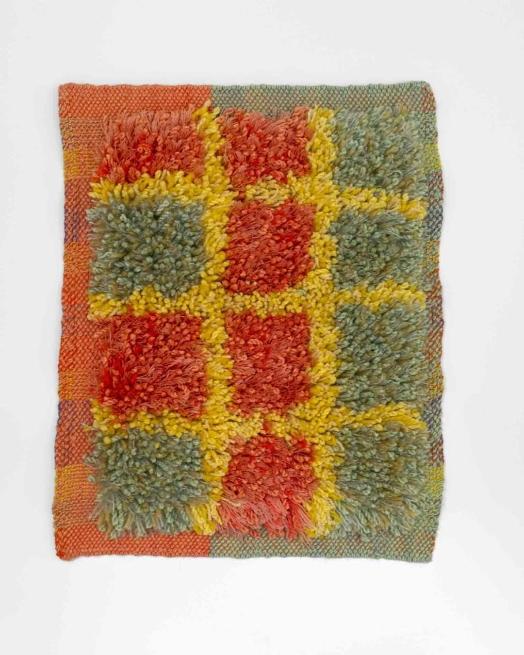 Rya window, a handwoven textile by artist Sofie Karlsson, features fibre, colour, and structure that unfold with restraint and clarity. Woven in wool and cotton, the piece draws from domestic craft traditions, using surface and texture as a visual la