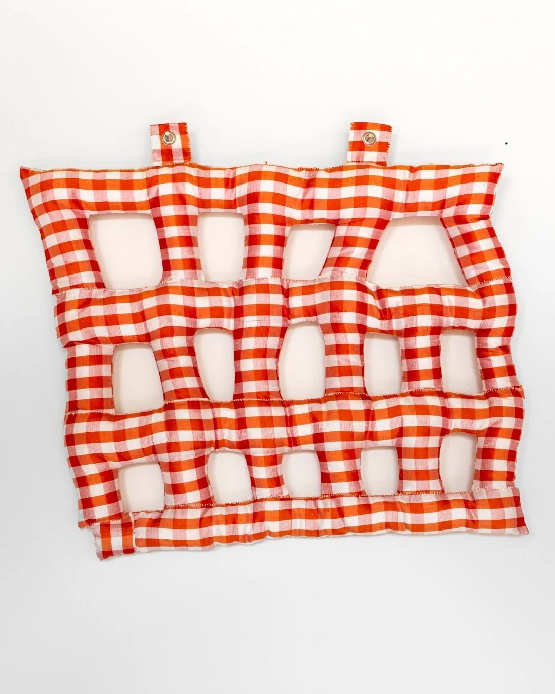 Picnic II, a hand-sewn textile piece by Sofie Karlsson, is created through a meticulous combination of hand and machine stitching using silk, wadding, metal, and cotton. The work explores colour and structure as a tactile language, drawing deeply fro