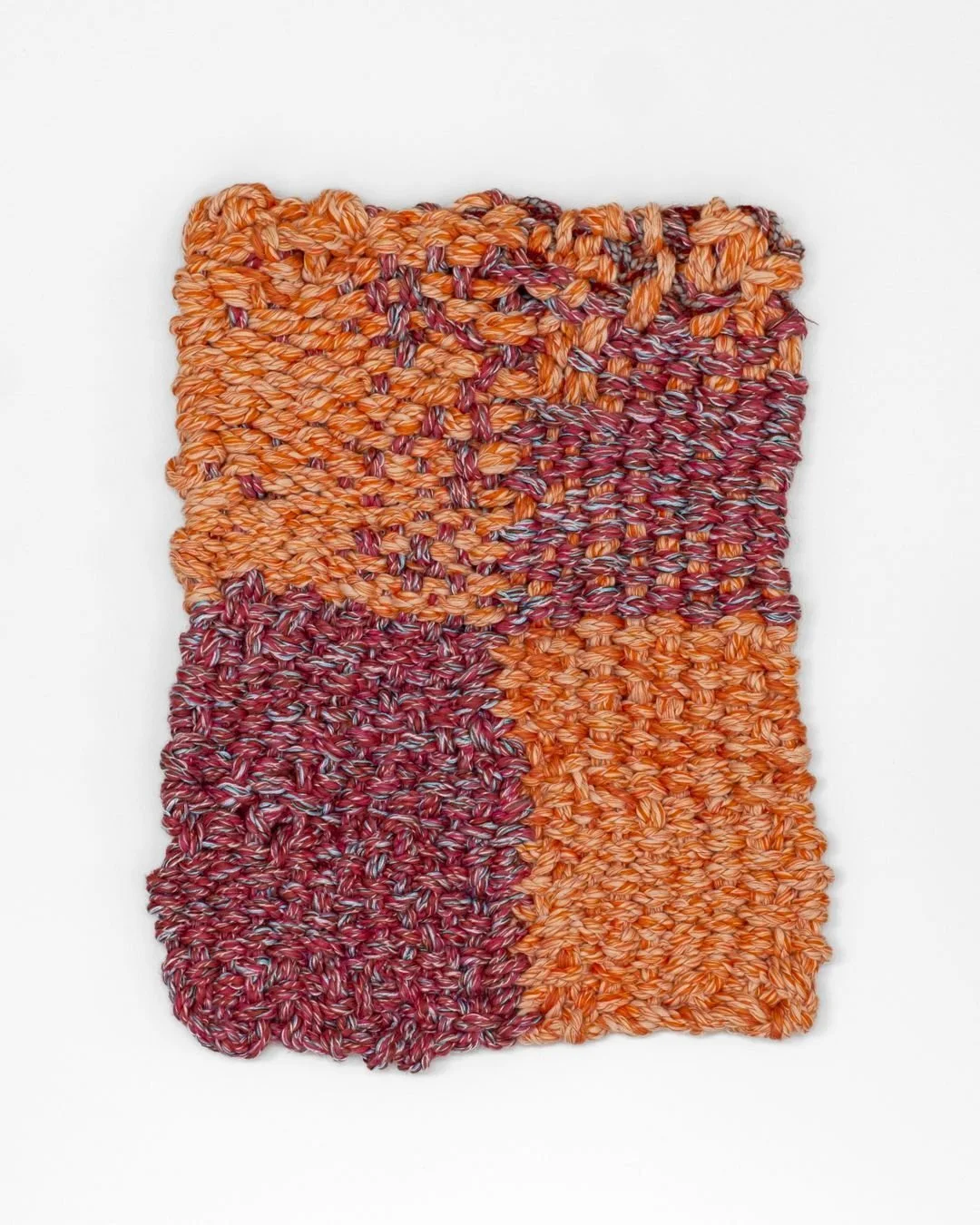Orange Square, a handwoven textile piece by Sofie Karlsson, is meticulously crafted using a combination of ropemaking and weaving. The work explores colour and structure as a tactile language, drawing inspiration from domestic craft traditions and th