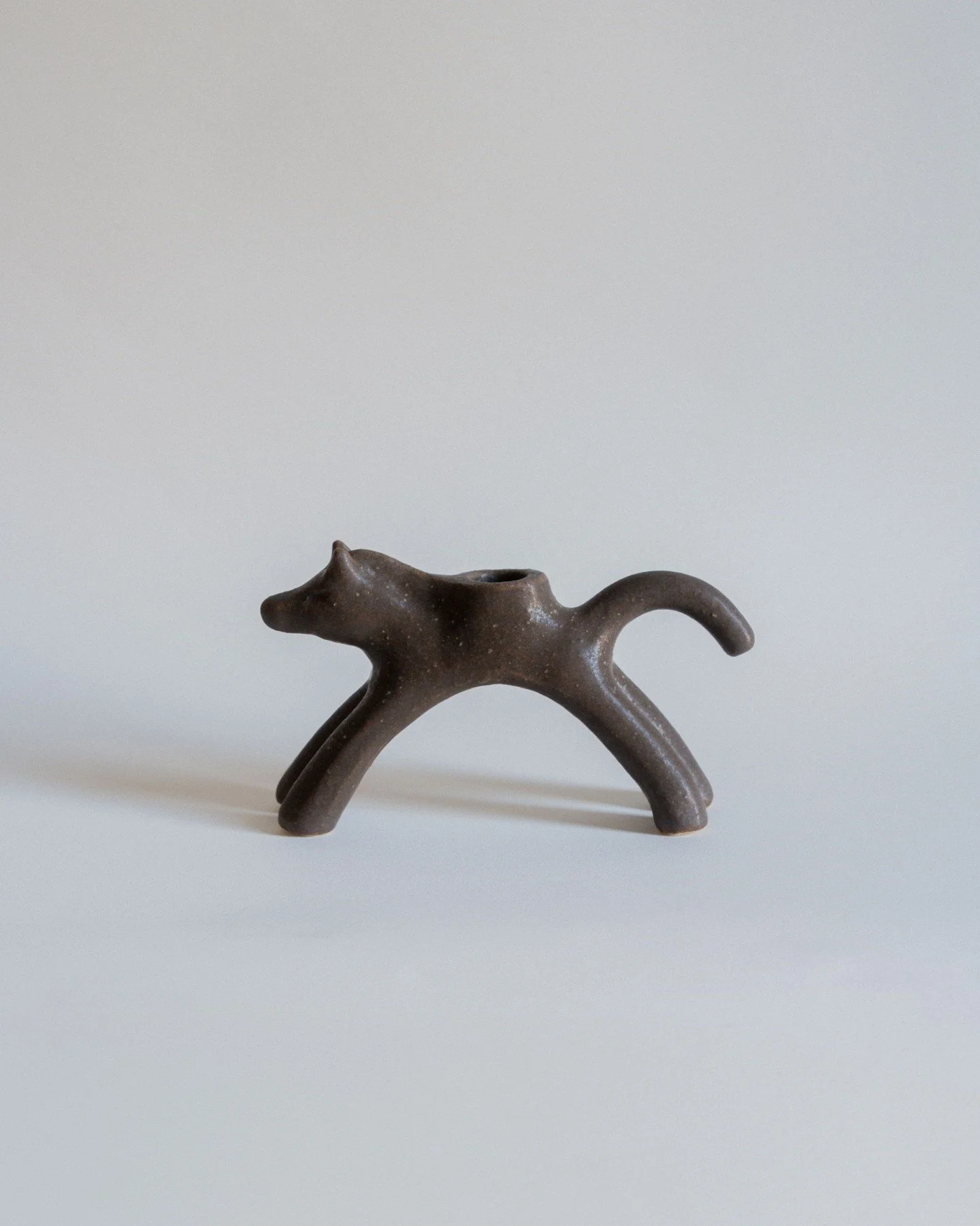 Caballo Chocolate 

Handbuilt in white chamotte stoneware and finished with a brown matte glaze, this sculptural piece is shaped by hand and fired at 1250&ordm;C. 
Each singular work carries its own provenance and the distinct voice of the crafter, r
