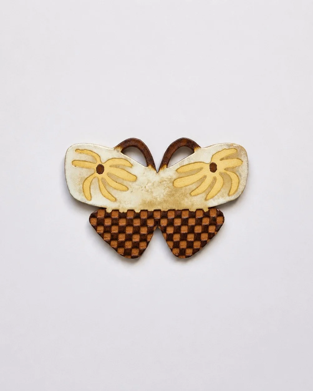 Butterfly Miss Sunshine Wall Piece

Hand-built in glazed stoneware by Anna Kes&auml;niemi in Helsinki, each butterfly relief explores colour, texture, and playful composition through a tactile ceramic surface. Shaped and glazed by hand, every piece c