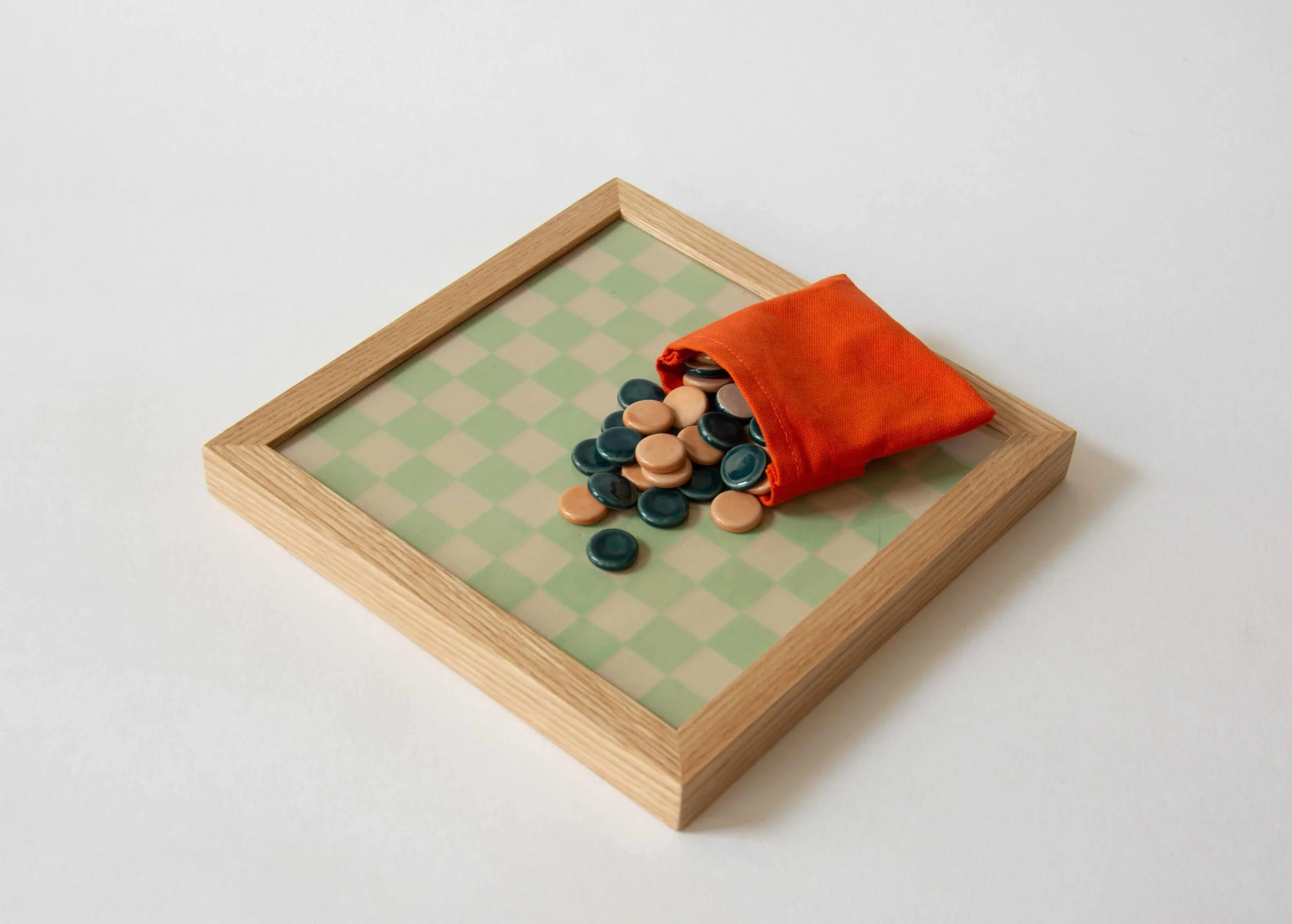 Green Ceramic Checkerboard Set by @timm_ceramics, handmade in Rotterdam. Part of our selection of handmade objects. Available online. Link in bio.