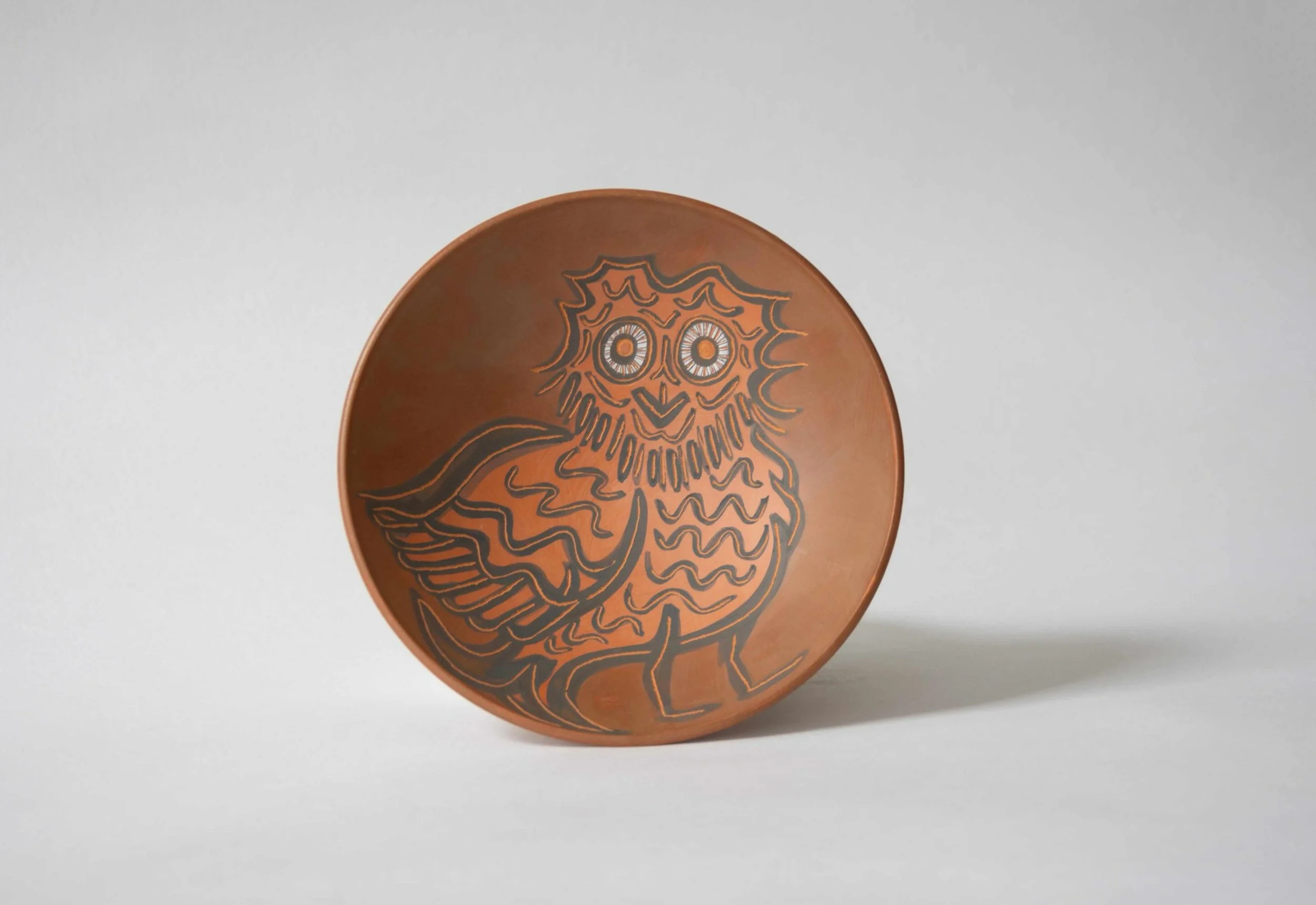 Owl Ceramic Bowl is wheel thrown in stoneware and decorated with terra sigillata. Created collaboratively by Maud Timmermans and Samantha Thole, each wall bowl combines hand applied imagery and ceramic forms designed for display.

Part of our selecti