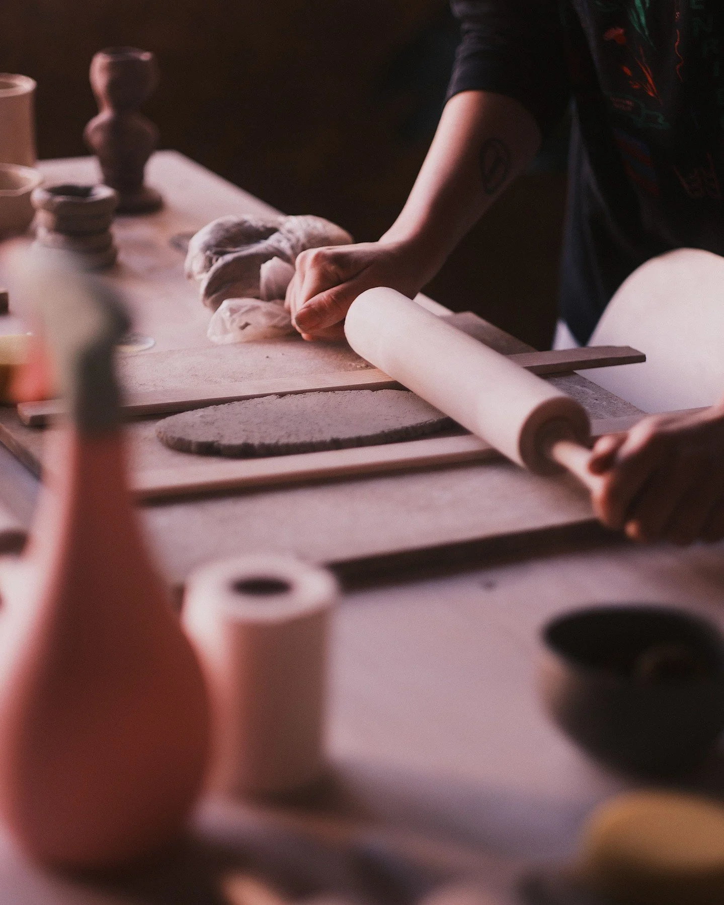 "What I like most about the material is that it allows you to play, experiment, and follow its natural movement. I mainly work with the coil technique, building each piece slowly by hand. It is mostly my hands that shape the clay throughout the 
