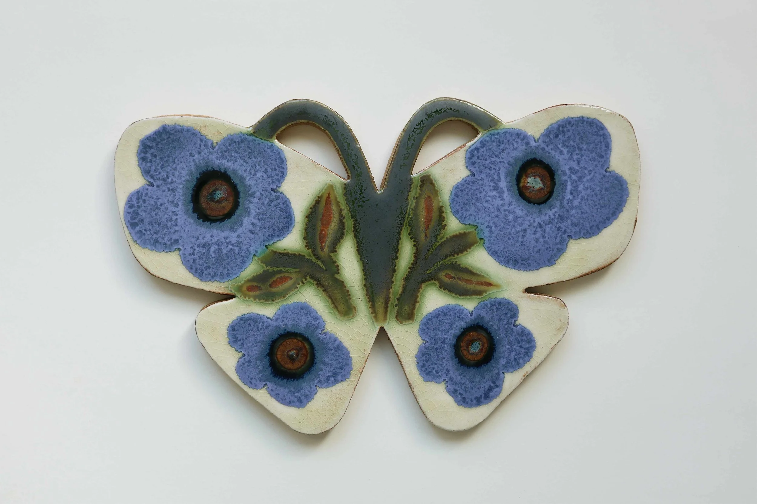 Love in a Mist Ceramic Relief by Anna Kesäniemi · Helsinki