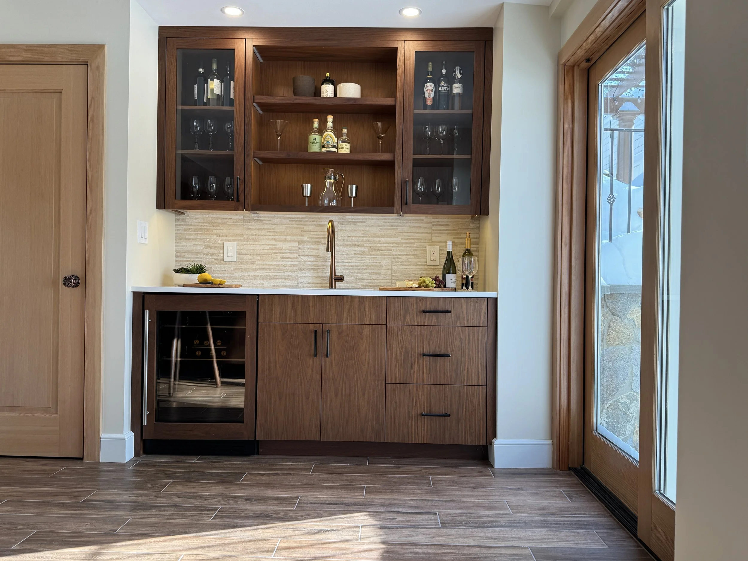 lexington-basement-custom-bar-walnut-cabinetry-glass-upper-cabinets-wine-fridge-abbeyk.jpg.JPG