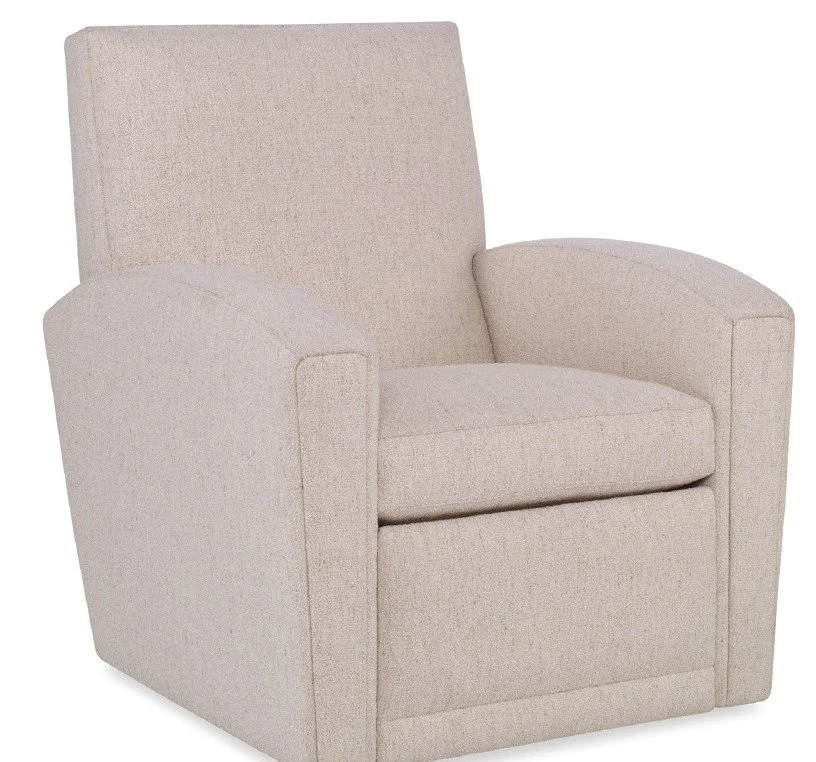 Cam recliner from Kravet has curved arms, straight lines and a tall back