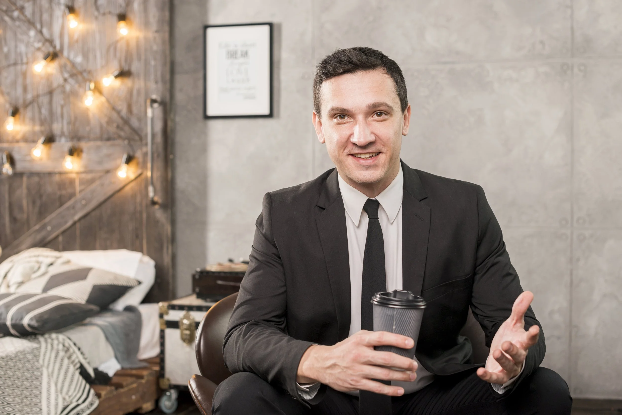 businessman-sitting-with-cup-coffee-room.jpg