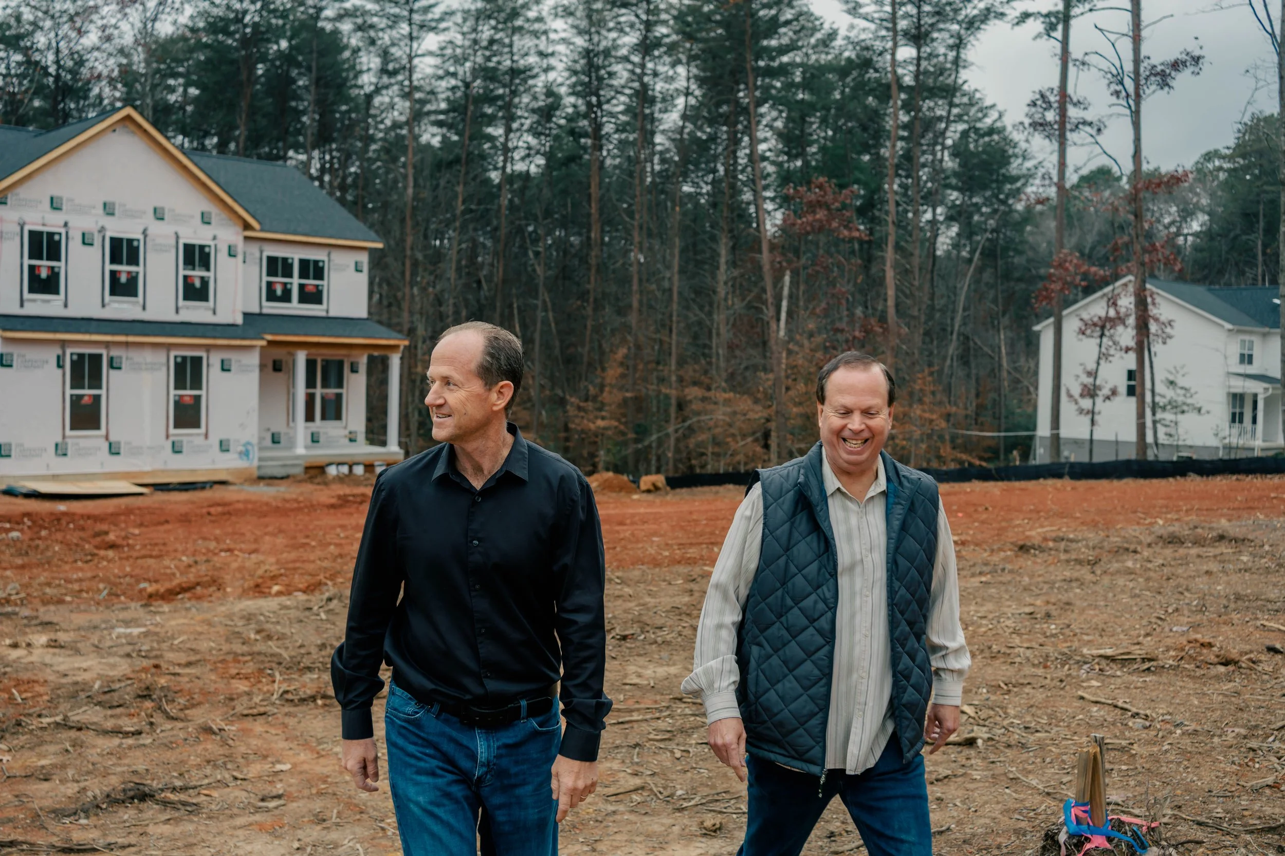 R&W Homes team member reviewing custom home plans in Fredericksburg Virginia office