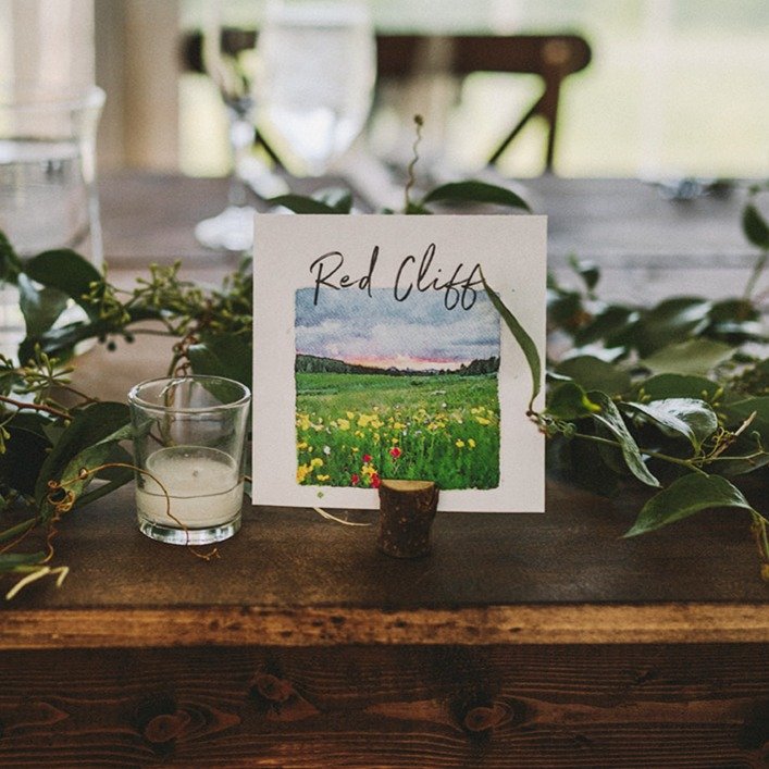 Such fun table numbers for this Camp Hale wedding.

We loved incorporating personal details &mdash; each table named after a favorite Colorado hiking spot. Meaningful touches like this make your celebration feel even more you.

Photo by @jessicachris