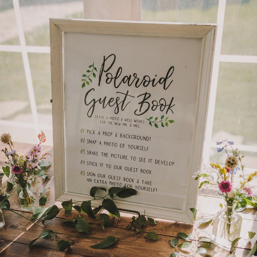 We will always say yes to a polaroid guestbook setup 📸

It&rsquo;s fun, a little nostalgic, and gives guests something to actually do&mdash;and adding custom signage just makes it feel that much more intentional.

What&rsquo;s one interactive detail